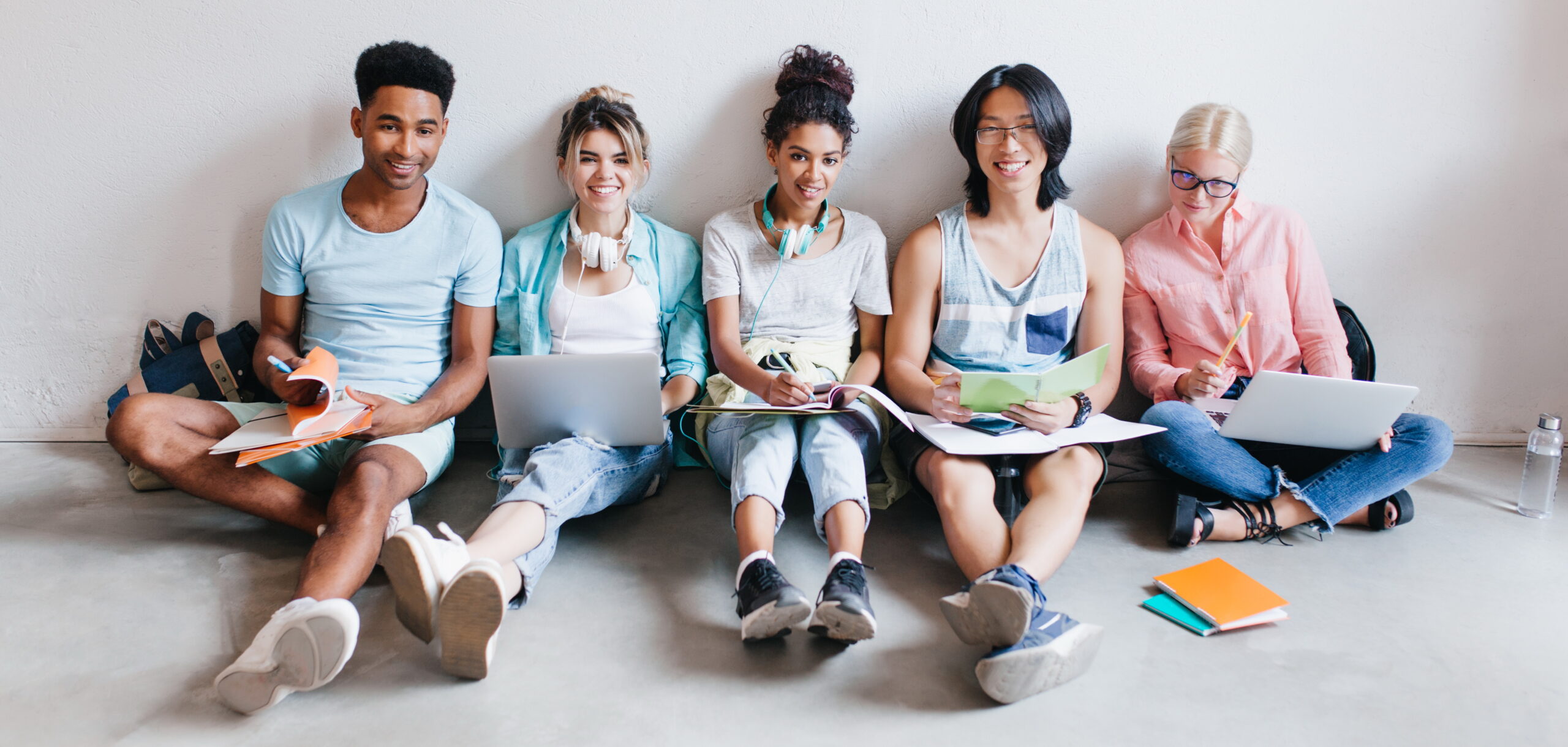 A group of digital artists sit together